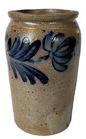 K1741 19th century cobalt blue decorated Stoneware Jar attributed to Peter Hermann of Baltimore, Maryland.  Beautiful hand painted heave cobalt blue flowers encircle the tall, cylindrical form with flat bottom, tooled shoulder, and slightly flared, flat-topped rim. Great condition. Peter Hermann�s pottery was on Edger Street in Baltimore from 1850-1872.  Measurements: 4 &frac34;� top diameter x 5 1/8� bottom diameter x 8 &frac34;� tall. 