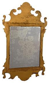 L59 19th century beautiful Chippendale looking glass retaining original mirrored glass with good silvering and old mustard painted surface. Signed �Dr. Briggs 1898� in graphite on back board. Overall measurements: 11 &frac12;� wide x &frac34;� thick x 19 &frac34;� tall (Mirror measures 8 &frac14;� wide x 10 &frac34;� tall). 