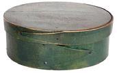 L353 Exceptional mid-19th century New England steamed and bentwood oval pantry box retaining its original green painted surface. Opposing finger lapped construction secured with tacks and tiny square head nails. Clean interior. Measurements are: 5 &frac14;� x 4� oval x 2� tall.  