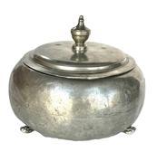 L266B Early lidded pewter pot. Hand hammered surface with soldered footed base and decorative finial on lid. Unmarked. Approximate measurements: 8 &frac14;� diameter x 6 &frac12;� tall including finial. 