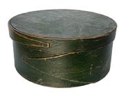 F526 19th century New England Pantry Box in its dry original Windsor green paint. Steamed and bentwood sides with opposing fingered body and lid secured with tacked and wooden pegged construction. Natural patina interior. Circa 1850s. Measurements: 8� diameter x 3 &frac12;� tall. 