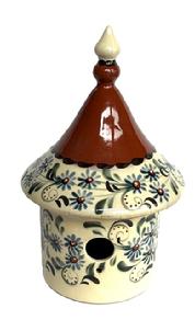 M138 Beautiful Signed and dated 2009 Eldreth Pottery painted and slip-decorated Redware Birdhouse. Two pieces so that lid can be removed for easy cleaning. Bottom is impressed with �DAVID ELDRETH NOTTINGHAM PA� and �Eldreth 2009 KMc� is carved into the redware clay.  Measurements: middle diameter (base of lid) is ~7�, base diameter is 5� and overall height is ~11� tall.  