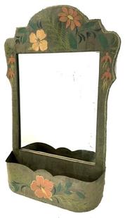 M305 Late 19th century mirror with molded metal-wrapped decoratively shaped frame with very early silvered back looking glass and scalloped edged tin comb box below. Original hand painted surface retains tole painted floral motifs. Measurements: 19 &frac12;� wide x 29 &frac34;� tall x 5 &frac12;� deep. Mirrored area measures 14� wide x 17 &frac12;� tall.  