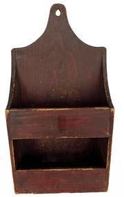 **SOLD** RM1516 Pennsylvania original red painted double wall box with shaped ends and a tall, shaped back with a hole for hanging purposes. Mixed nail construction. Circa 1850�s � 1870s. Measurements: 11� wide x 6 &frac12;� deep x 20 &frac12;� tall