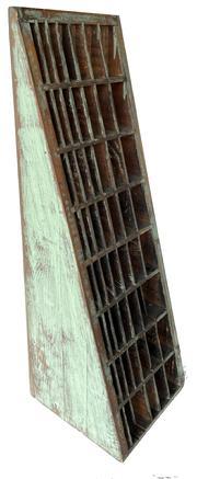 L66 Unusual early 20th century original blue painted Country Store display cabinet with remnants of original label on the back. Tapered, triangular shape wooden case with individual dividers and mortised stretchers. Remnants of an old wooden ruler remains intact on the lower right side. Found in Pennsylvania. Measurements: 9 &frac12;� wide x 30 &frac34;� tall. Top is &frac34;� deep and tapers to 10 &frac14;� deep at bottom. 