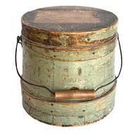 L501 19th century New England original gray painted firkin with tongue and grooved staved sides secured with steamed and bentwood bands. Each band is secured with small tacks and one tiny staple at the end of the fingerlap. Remnants of paper label on lid. Nice wear. Clean, natural patina interior. Measurements: 7 3/8� diameter (top) x 8 &frac14;� diameter (bottom) x 7 &frac14;� tall. 