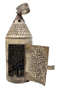 M252 19th century punched tin Lantern retaining original worn, gray painted surface. Symmetrically punched and pierced patterned designs consisting of dots and dashes, along with circular holes in conical top for venting purposes. Door, which is �hinged� with wire loops, opens freely for easy access to interior candle socket and retains its original working hasp closure (loop is missing on cylinder). Attached round metal handle at the top for carrying / hanging. Found in Pennsylvania. Measurements: ~15� tall (including ring) x 5 1/8� diameter. 