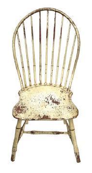 L121 19th century Pennsylvania Bow Back Windsor chair with nine spindle back and bamboo turnings in old white over original red painted surface. Great wear from years of use.  Measurements: 16 &frac34;� wide across front of seat x 16 &frac12;� deep seat x 37 &frac12;� tall back. The seat is 16 &frac12;� tall.  