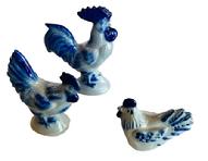 M113 Group of three small Eldreth Pottery Chickens with cobalt blue accents � The middle-sized one is signed and dated �97 on bottom, whereas the other two are signed and dated 1999 on bottoms. Graduated heights as follows: 4 3/8� tall, 3 5/8� tall and 2 &frac14;� tall.   