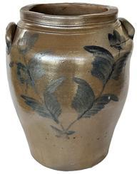 K1683 19th century Cobalt blue decorated four-gallon Stoneware Crock with applied lug handles. Ovoid jar with cobalt floral decoration on the front and reverse. A stamped �4� inside a circle is visible by one of the handles. Measurements: 8� x 8 &frac14;� top opening x 14 &frac12;� tall.   