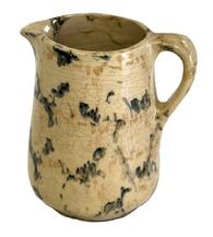 CM7 Small Spongeware Salt Glazed Pitcher featuring teal and tan colored sponge decoration on an ivory- colored background. No chips or cracks. Crackling to surface indicative of age. Measurements� 4 &frac12;� tall and rests on a 2 &frac12;� diameter footed base. 