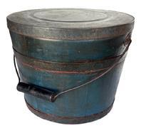 L397 Spectacular identified original blue painted lidded wooden bucket � Stamped on bottom � ��.Made & Warranted, by JAMES WITCHER�.� with arched wire bail handle and turned wooden grip. The thick, solid wood lid is rimmed by a &frac34;� tall metal band secured with hand forged tacks. The interior is old natural patina. Tongue and grooved staved construction held in place with &frac34;� tall metal bands secured with hand forged tacks. Measurements: 11 &frac34;� � 12� top diameter x 10 &frac14;� bottom diameter x 9 &frac14;� tall.  
