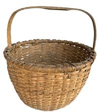 M158 Sturdy 19th century round woven oak splint basket with natural surface, thick, hand-carved steamed and bent, notched handle that is woven into the sides. Double wrapped, double rim. The tightly woven bottom includes a slightly bumped up interior for help with weight distribution and airflow. Measurements: 14 &frac34;� x 15� top diameter x 15 &frac12;� tall with handle. The sides are ~8 &frac12;� tall. 