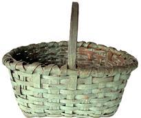 K1627 Early hand-woven splint basket featuring a double-wrapped double-rim with notched, steamed and bent handle in its original green painted surface. The oval top opening tapers to a rectangular shaped bottom. Natural patina interior. Very sturdy basket. Measurements: 16 &frac12;� x 12� oval top opening. The rectangular bottom measures 10 &frac12;� x 9 &frac12;�. Sides are 6 &frac14;� tall. Overall height at handle is 12� tall.