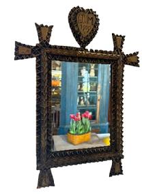 M81 Early 20th century American Tramp Art Mirror with a Heart bearing the initials �J. M.� and dated �1909�. Hand chip-carved and bears the original gold gild painted surface. Tiny square head nail construction.  Overall measurements: 11� wide x ~1� deep x 15� tall.