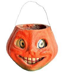 L311 1930s Paper Mache Pulp Pumpkin Smiling Jack O Lantern. Circa 1930-1940s. The lantern retains great original orange and green surface with what appears to be its original wire handle and paper insert for eyes and mouth. �M E M 15c� is written on the top edge of the opening. Great condition! Pumpkin measures ~ 7� at widest point x ~6� deepest point x and is 5 &frac14;� tall not including handle. 