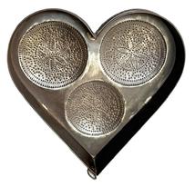 **SOLD** M185 Exceptional 19th century Pennsylvania heart shaped tin cheese strainer / mold with three separate pierced / punched pinwheel decorations, attached feet and attached loop for hanging purposes. Nicely rolled edges and all solder joints are secure. Fantastic condition. Measurements: ~14 &frac14;� long x ~ 14 5/8� wide. Strainer stands ~3� tall, including the feet. 