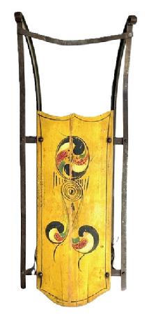 W59 Late 19th century to early 20th century original paint decorated Child�s Sled with red, green and white decoration on a mustard background with black pinstriping. Age-appropriate wear to the paint. Wrought iron runners with wooden platform. A wire has been attached for hanging purposes. Approximate overall measurements: 32� long x 12� wide x 9 &frac12;� tall.  