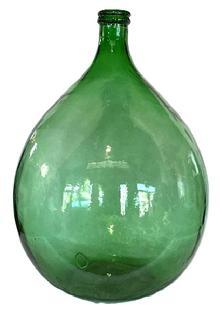 L172 Large molded green glass Demijohn bottle featuring double ring lip with tapered neck over bulbous body, mold lines at sides, shaped and slightly depressed base. Bubbles throughout. Approximate measurements: 25" tall x 3� top diameter. 