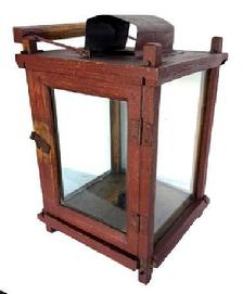 M1114 19th century Pennsylvania original red painted wooden Lantern. Four bubbled glass panels are contained within a wooden pinned and post construction frame. Hinged door allows easy access to the candle.