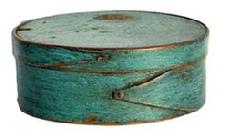 L468C Small 19th century New England oval pantry box in its beautiful original blue paint. Overlapping opposing fingered body and lid. Copper tack and tiny wooden pegged construction. Natural patina interior. Very sturdy. Measurements: 5 &frac12;� x 4 1/8" oval x 2 1/8" tall. 