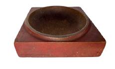 **SOLD** K195E 19th century treenware square hand carved wooden mortar chopping bowl / soap dish bearing original red painted surface. A raised lipped edge surrounds the opening. Natural patina interior boasts extensive wear indicative of age and use. Overall measurements: 7� x 7� square x 2� thick. The opening is ~5 &frac34;� diameter. 