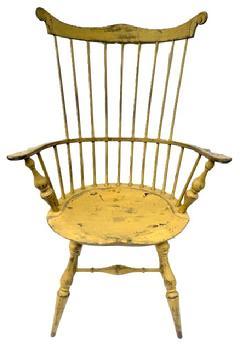 E494 Bench made Rhode Island nine spindle comb back Windsor Armchair in beautiful mustard yellow painted surface. Signed on bottom. Measurements: Seat is 20 &frac34;� wide x 16 &frac14;� deep x 17� tall. Overall height in back is 42 &frac34;� tall. 26 &frac14;� wide across arms.  