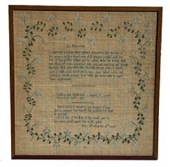 M308 Exceptional early 19th century identified and dated, hand-stitched sampler by �Catharine O Hevius   Aged 11 years   January 29th 1828�.  Sampler is stitched with what appears to be cotton threads over linen material and boasts blues, green, brown, and ecru colors.  Features a central verse entitled �On Education� above her identification and the full Bible verse of �Prov. 31st chap 30. 31st verses� below. This fantastic work is surrounded by an intricate vine and flowers along all four edges. Appears to have been professionally mounted and framed as a sticker from �L. Bamberger & Co � Newark, NJ� remains intact on the back. Wire on back for hanging purposes. Framed measurements are 17 &frac34;� wide x 18 &frac14;� tall x 3/8" thick.