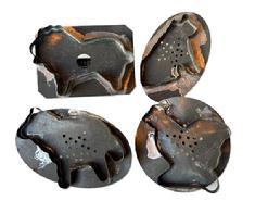 K1879A  Group of four animal shaped flat backed Tin Cookie Cutters with handles. All solder joints are secure. Lion cutter measures 4 &frac14;� wide x 3� tall. Both oval ones are 4 &frac14;� wide x 2 &frac34;� tall and the chicken measures 3 &frac12;� in diameter.  