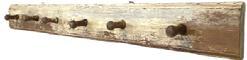 K1545 18th century Lancaster County, Pennsylvania peg rack bearing remnants of original oyster white painted surface and early rosehead nails. Peg rack features molded edges on both top and bottom edges of the back board and six (6) sturdy pegs with bulbous ends. Measurements: 51 &frac34;� wide x 5 &frac34;� tall. Each of the pegs are approximately 2 &frac12;� deep.     