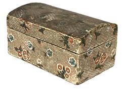 K257 Early 18th century wooden dome top wallpaper covered box. �T� nail construction. The hinged lid opens to reveal a wooden dust rim and is completely covered with a different wallpaper.  The wallpaper on both the exterior and the interior, are hand colored. Measurements: 7 &frac14;� wide 4 &frac12;� deep x 3 5/8� tall.  