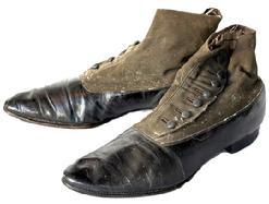 K1877 Pair of 19th century button top leather and canvas Shoes / Boots � the soles read �SelZ Chicago� and �The Sole of Honor�. Each of the shoes retains their original 7 buttons. SELZ is a brand of footwear manufactured and distributed by Chicago-based Selz, Schwab & Co. (1890-1929) and was known for the slogan �SelZ Shoes � Make Your Feet Glad�.  Approximately 11 &frac12;� long x 3 &frac12;� at widest point x 5 &frac14;� tall. 
