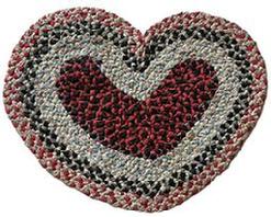 K1539 Heart shaped hand braided rug / mat with fabrics featuring reds, black, blues, white and a hint of orange colors. Nice condition. Measurements: 24 &frac12;� wide x 19� tall. 