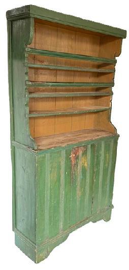 G329A 19th century hooded open top pewter cupboard with mortised plate rails, applied molding, decorative cut out sides and feet bearing original green painted surface with mustard painted interior.  Reeded decoration to the front of cupboard. The 1/3 sized door opens to reveal a clean, natural patina interior. Circa 1870sMeasurements: 39 &frac34;� wide x 13 &frac12;� deep x 72� tall. 