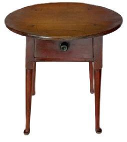 **SOLD** L467 18th century New England Queen Anne splay leg table with canted, dovetailed drawer and padded feet in original red painted surface. The beautiful one-board oval top is secured to the apron with wooden pegs and the drawer stretchers and apron boards are fully mortised and pegged into the delicately turned splay legs. Measurements: 19 &frac12;� wide x 15 &frac12;� deep x 22 &frac12;� tall.  