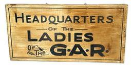 RM1620 Single sided wooden sign advertising �Headquarters of the Ladies of the G.A.R.� in black lettering on a discolored white painted background. Original eye hooks remain in the top for hanging purposes. Unsigned. Measurements: 21 5/8� wide x 11� tall x 7/8� thick. (NOTE: The Ladies of the G.A.R. refers to the �Ladies Grand Army Republic� � a Women�s Auxiliary Organization founded in 1866 for the mothers, daughters, wives and sisters of Union Veterans of the Civil War that is dedicated to preserving the history of the Union and advocating for veteran�s rights and benefits.) 