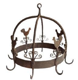 L455A A very fine wrought iron game hanger known as a Dutch Crown. This is in the style of game hangers dating from the 18th century, but this one was probably made in the early 20th century. It is a fine-made example decorated with scroll work, birds and attached to the arched bars. It has 8 hooks from which game would have been hung to mature, but it would now be ideal for hanging kitchen utensils. It is topped with a suspension loop with rooster figures and scroll decors. Light wear consistent with age and use, Patina consistent with age and use. Approximate measurements: 15 &frac12;� diameter (to outer points of hooks) x 13� tall (in center.) 