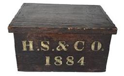 **SOLD** L85 Wooden shipping / storage box with lid bearing original surface with �H.S. & Co. 1884� painted in gold gild over white on the front. Applied molding surrounds the removeable lid. The wood is pine. Tiny square head nail construction throughout. One end of the clean interior bears �TC & Co   Portland� stenciled in black paint. (NOTE: The Twitchell-Champlin Grocery Company (1884-1924) of Portland, Maine was a spice mill, candy factory and cannery for the commercial port during this time period.) Measurements: 14� wide x 11� deep x 7 &frac14;� tall.  