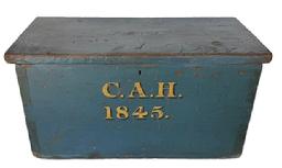 i856 19th century Pennsylvania Document Box with spectacular blue painted surface bearing "C.A.H.� �1845� exceptionally hand painted in mustard with black painted shadowing on the front. Natural patina interior. Dovetailed case. The wood is pine with square head nail construction. Measurements:  20 &frac14;� wide x 10� deep x 10 &frac12;� tall.  