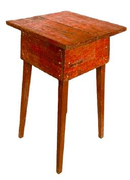 M130 19th century Eastern Shore, Maryland original red painted side table with wrap around apron resting on tall, splayed legs. Very primitive, square head nail construction. Circa 1860s. Measurements: 17 &frac14;� x 16 5/8� x 31� tall. 