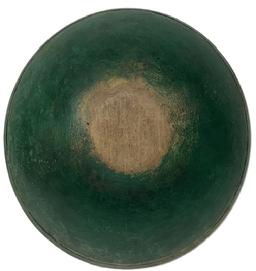 L343 Early 19th century New England wooden turned bowl retaining its old green painted surface. Bowl is slightly out of round, features a band around the rim and shows strong evidence of slow lathe turning on both the interior and exterior. Natural patina interior with a few age cracks that do not affect the integrity of the bowl. Great wear from years of use. Measurements: 15 &frac14;� x 14 &frac14;� diameter x 4 &frac14;� tall. 