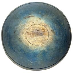 **SOLD** L489 Large, early 19th century hand turned solid wooden Dough Bowl bearing original dark blue painted surface with prominently lipped rim and evidence of slow lathe turnings throughout. Bowl rests on an ever so slightly footed base and retains great natural patina interior with wear indicative of years of use. Out of round. Extensive crack on each side (previously glued), one with an early make-do repair using wire staples. Measurements:  18� x 18 &frac12;� diameter x 5 &frac34;� � 6 1/8� tall (depending on where measured). 