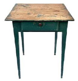 L389 19th century North Carolina original green painted one drawer table resting on tall, gracefully tapered Hepplewhite legs. The drawer stretchers are mortised through both front and back of the apron. The legs are fully mortised and pegged into the apron. The top is secured with wooden pegs and square head nails. Drawer is mortised / nailed construction. The wood is yellow pine.  Measurements: 25 &frac14;� wide x 25 &frac14;� deep x 30 &frac34;� tall. 