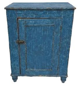 K1854 Mid-19th century York County, Pennsylvania one door cupboard with original blue painted surface and turned feet. The fully mortised door is surrounded with a crisp beaded edge and opens to reveal a clean, natural patina interior. Case is dovetailed at the bottom. Circa 1850s. The wood is pine. Great size!  Measurements: 29 &frac14;� wide x 19 &frac34;� deep x 37 &frac34;� tall.   