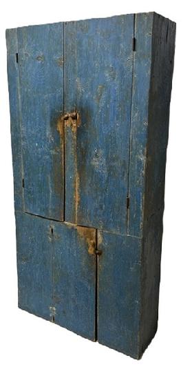 M262 19th century Mid-Atlantic flat wall cupboard bearing early blue painted surface. Unusual layout with two doors over one door configuration. The wood is yellow pine with square head nailed construction. Remnants of beaded edges by the door openings. Clean, natural patina interior - with inside of top featuring three fixed shelves, and interior of bottom featuring two fixed shelves.  Measurements: 37� wide x 13 &frac14;� deep x 74 &frac34;� tall. 