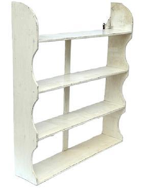 L301 19th century hanging shelf with shaped ends and mortised shelves retaining its original white painted surface. An original mortised brace supports the center back of the shelf for added stability. The wood is pine with wire nail construction. Circa 1870s-1880s. Measurements: 35 &frac14;� wide x 7 &frac12;� deep x 39� tall. 