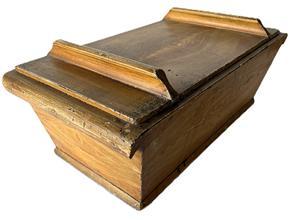 K1825 19th century Pennsylvania lidded dough box in original mustard grain painted surface. Dovetailed and square head nail construction with lid that retains two original grasp battens. Clean, natural patina interior. Applied curved molding on each end acts as sturdy handles. The wood is pine. Circa 1870s-1880s. Measurements: 27 &frac12;� long x 14 &frac34;� wide x 9� tall sides x 11� tall at battens. 