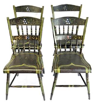 M207 Early 19th century Pennsylvania set of four matching plank bottom Chairs with paint decoration. The background color is black with green decoration.  The crest of the chairs feature fruit and leaves, in blue and white, red and gold. A flower motif adorns the middle crest and wide decorative striping adorns the seats. All four Chairs are matching, have great painting and are in great condition. Circa 1830 � 1850. Measurements:  Seats are 15 &frac14;� wide x 14� deep. Seat height is 17 &frac12;�. The backs are 32 &frac14;� tall. 