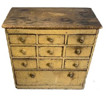M263 19th century New England painted Apothecary with ten (10) drawers in a nine-over-one configuration retaining its old mustard yellow painted surface. The wood is pine with square head nail construction. Circa 1850s. Measurements: 34� wide x 19� deep x 32 &frac14;� tall. 