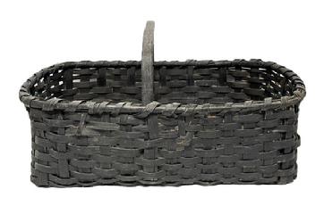 RM1649 Large rectangular 19th century gathering basket in original black paint. This sturdy woven basket boasts double steamed and bent rims that are single wrapped, a thick, steamed and bent handle that is notched and woven into the sides of the basket, and thick steamed and bent slats on each end of the bottom that are woven into the sides and act as �feet� for the basket to rest on.  Minor losses from age and use, but still a sturdy basket that displays beautifully. Measurements: 27" long x 18" wide. Sides are ~8�- 9� tall, depending on where measured.  ~14� tall at handle.  